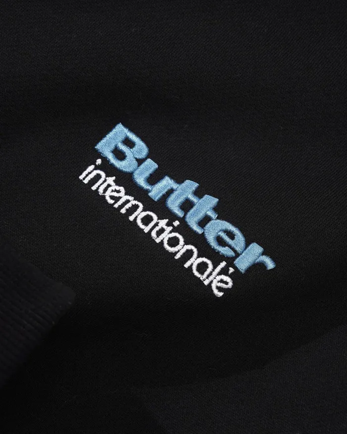 Fleece Men Butter Goods Internationale Embroidered Crewneck Black Fleece Men Butter Goods Internationale Embroidered Crewneck Black