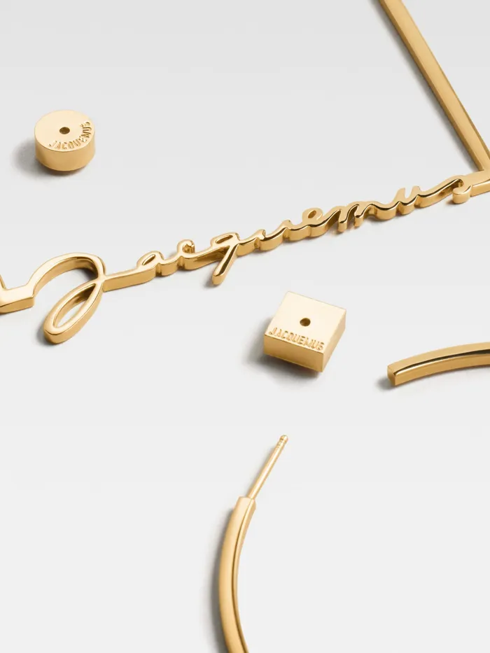 JACQUEMUS Jewellery Asymmetric Signature Logo Earrings Gold 8211 Women