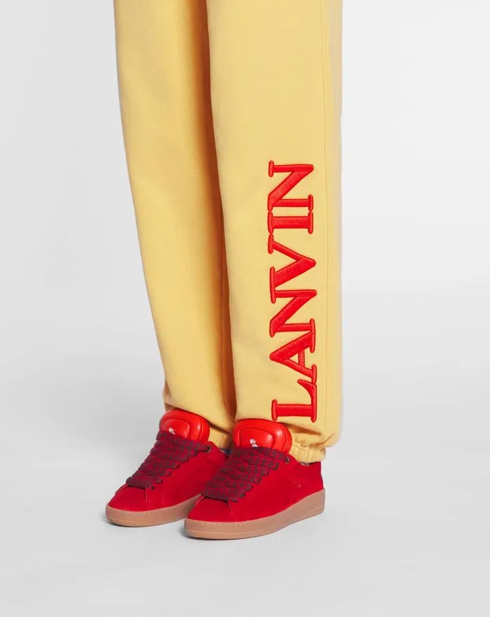 Men Lanvin Pants and Shorts Lanvin X Future Unisex Logo Jogging Pants Corn Men Lanvin Pants and Shorts Lanvin X Future Unisex Logo Jogging Pants Corn