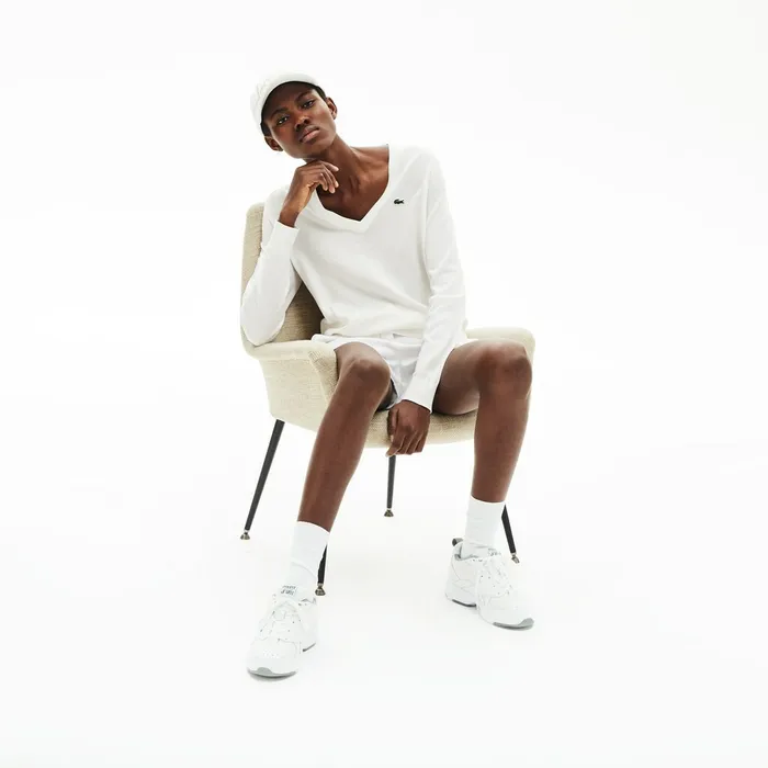 Solid Cotton VNeck Sweater White Womens Lacoste Sweaters and Sweatshirts Online Store Solid Cotton VNeck Sweater White Womens Lacoste Sweaters and Sweatshirts Online Store